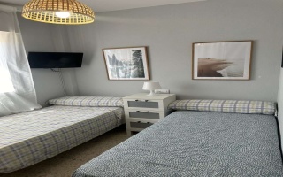 Apartamento Laguna de El Portil, alquiler temporada, piscina, pista de pádel, terraza acristalada, plaza de garaje

