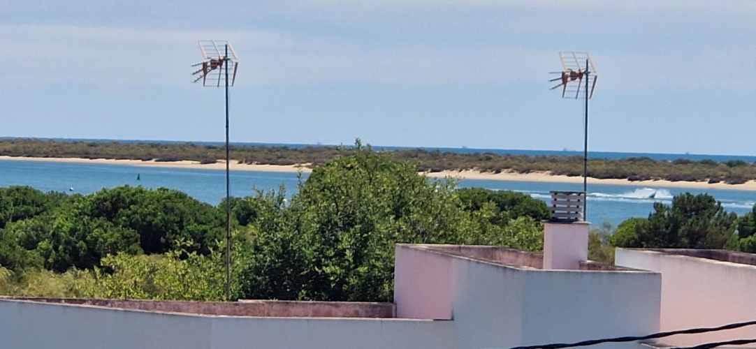 apartamento vacacional El Rompido, alquiler turístico Huelva, vacaciones Costa de la Luz, piso con piscina Huelva, vistas al mar El Rompido, alojamiento con WiFi, alquiler verano Huelva, apartamento playa Huelva, El Rompido turismo, alojamiento familiar Huelva