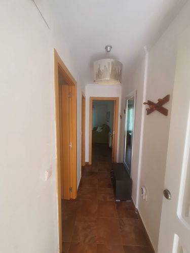 Casa adosada de 2 plantas en Nuevo Portil, con acceso directo a la piscina, terraza privada, 2 dormitorios y aire acondicionado. Ideal para vacaciones o estancias prolongadas.

