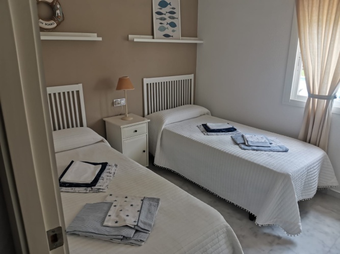 alquiler de temporada, casa adosada en Huelva, Playa del Portil, golf, piscina, alquiler vacacional, casa en la playa, Costa de la Luz, Cartaya, vivienda con terraza, estancias temporales

