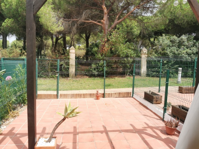 alquiler de temporada, casa adosada en Huelva, Playa del Portil, golf, piscina, alquiler vacacional, casa en la playa, Costa de la Luz, Cartaya, vivienda con terraza, estancias temporales

