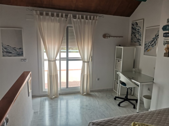 alquiler de temporada, casa adosada en Huelva, Playa del Portil, golf, piscina, alquiler vacacional, casa en la playa, Costa de la Luz, Cartaya, vivienda con terraza, estancias temporales


