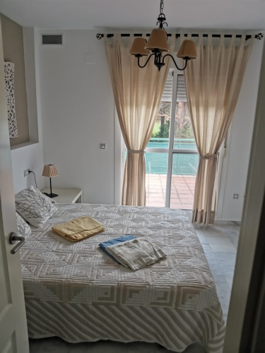 alquiler de temporada, casa adosada en Huelva, Playa del Portil, golf, piscina, alquiler vacacional, casa en la playa, Costa de la Luz, Cartaya, vivienda con terraza, estancias temporales

