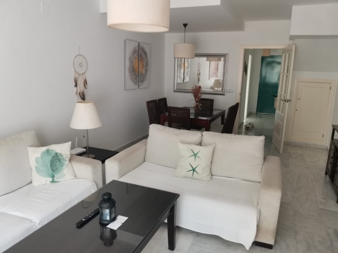 alquiler de temporada, casa adosada en Huelva, Playa del Portil, golf, piscina, alquiler vacacional, casa en la playa, Costa de la Luz, Cartaya, vivienda con terraza, estancias temporales

